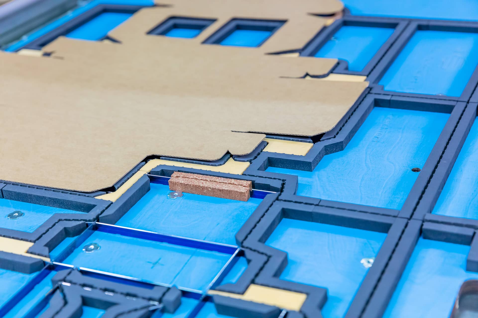 Corrugated board blank on a cutting-die